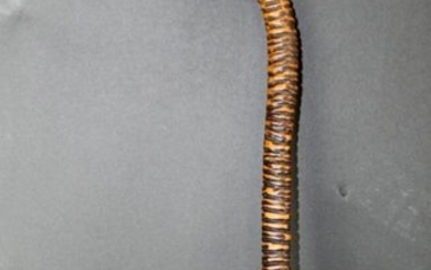 Carved walking stick with silverplate dog head