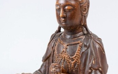 Chine, début XXe siècle, sujet en bois sculpté représentant la déesse Guanyin assise en lalitasana,...