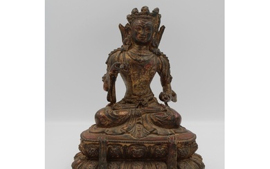 A Chinese Tibetan bronze Buddha figurine in cross legged med...