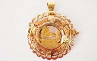 Convertible yellow gold brooch pendant with Egyptian style decoration.
