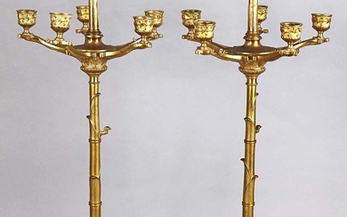 Coppia di candelabri a sei fiamme in bronzo dorato