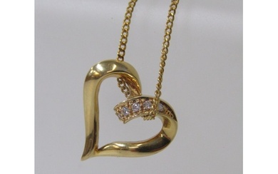 DIAMOND ENCRUSTED HEART SHAPE PENDANT, 18ct yellow gold pend...
