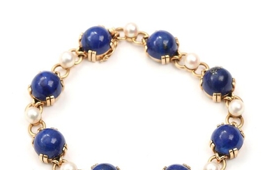 SOLD. F. Hingelberg: A lapis lasuli and pearl bracelet set with numerous cultured pearls and cabochon-cut lapis lasuli. – Bruun Rasmussen Auctioneers of Fine Art
