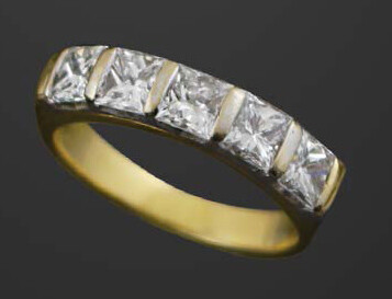 FACE in yellow and white gold with princess-cut...