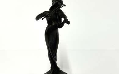FIGURE OF A GIRL PLAYING VIOLIN.