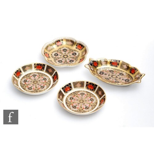Four Royal Crown Derby pin dishes of varying form decorated ...