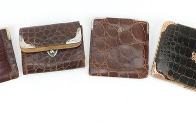 Four crocodile skin effect leather wallets and purses