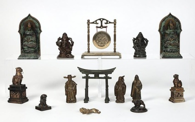 Fourteen Asian metal ware figures and objects