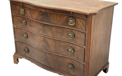 Georgian well figured mahogany serpentine front chest, the moulded...