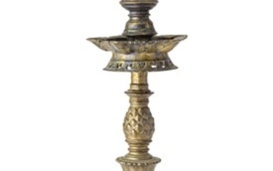 INDIA NILAVILAKKU BRASS OIL LAMP WITH BIRD FORM FINIAL, CIRCA 1800 H 31" DIA 9"