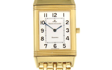 JAEGER-LECOULTRE - an 18ct yellow gold Reverso bracelet watch, 22mm.