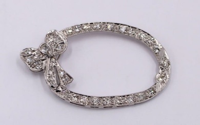 JEWELRY. 14kt Gold and Diamond Bow Brooch or