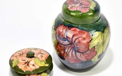 MOORCROFT; a ginger jar and cover decorated in the 'Hibiscus'...