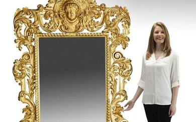 Monumental giltwood mirror in the Baroque style