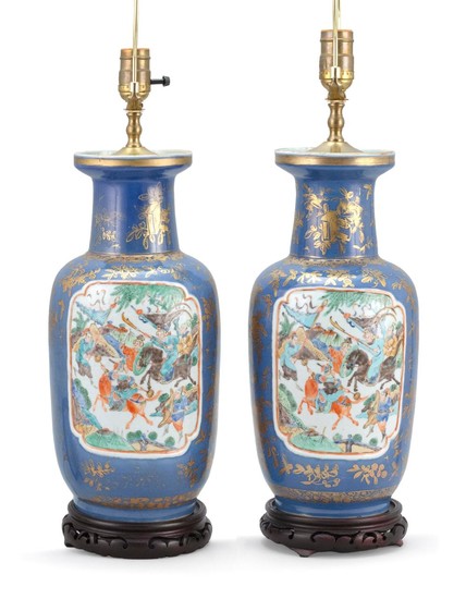 PAIR OF CHINESE POLYCHROME PORCELAIN VASES In rouleau form, with two famille verte cartouches depicting warriors on horseback. Powde...