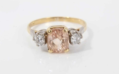 Padparadacha sapphire and diamond three stone ring