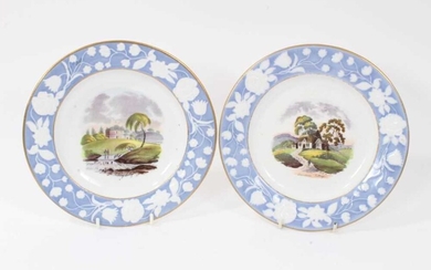 Pair of New Hall plates, circa 1815-20, with printed and coloured titled scenes, the edges with relief moulded foliate patterns on a blue ground, 20.5cm diameter