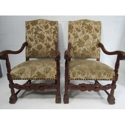 Pair of late Victorian, lions paw armchairs of large proport...