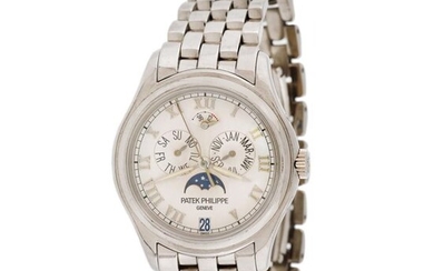 Patek Philippe Annual Calendar wristwatch, white gold, men, extract of the archives, white gold 18 k, d=37 mm, 169 (gross) / Men's white gold Patek Philippe Annual Calendar wristwatch, reference 5036/1g-001, automatic movement. Silver dial with Roman...