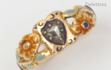 Polychrome enamelled gold and silver ring decorated with flowers, set with a rose cut diamond. Finger size: 55. Rough weight: 3.6g.