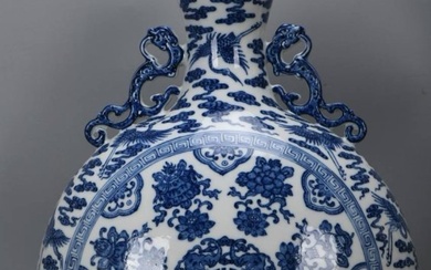 Qing Dynasty Qianlong blue and white cloud phoenix moon vase