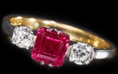 RUBY AND DIAMOND 3-STONE RING, High carat gold. Vibrant ruby...
