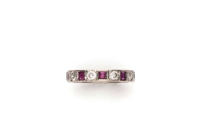 RUBY, DIAMOND AND WHITE ZIRCON ETERNITY RING, 1950s