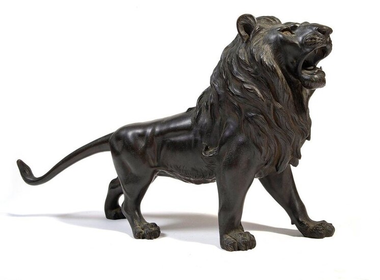 Sculpture en bronze représentant un lion...