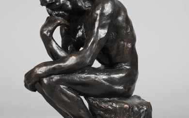 Statuette en bronze "Le Penseur" d'après l'œuvre principale d'Auguste Rodin, numérotée 135/999, marquée "reproduction dàpres...