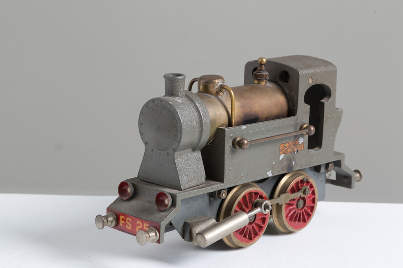 Steam train in iron and brass. GISEA