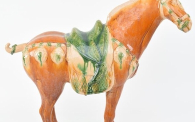 Tang style pottery horse. China. 20th century. San Tsai