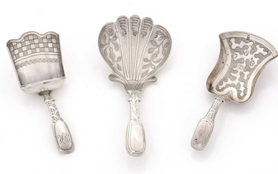Three silver caddy spoons.