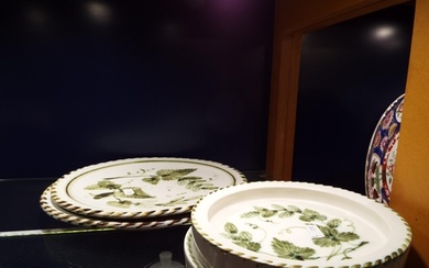 Two Rye pottery dinner plates and two shallow bowls with hop...