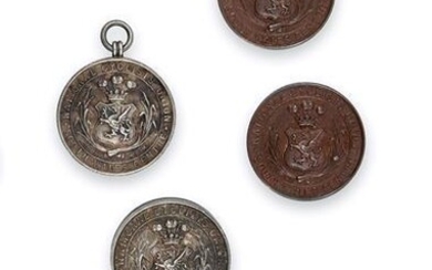 Two Victorian Silver Medals; A George V Silver Medal and...