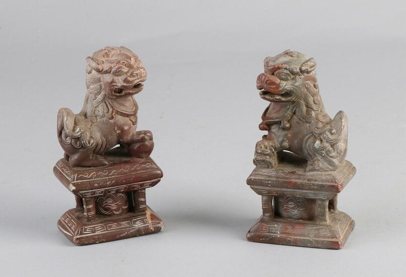 Two antique Chinese soapstone carved temple dogs on