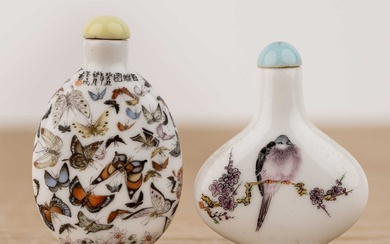 Two porcelain snuff bottles Chinese, 20th Century painted with butterflies,...