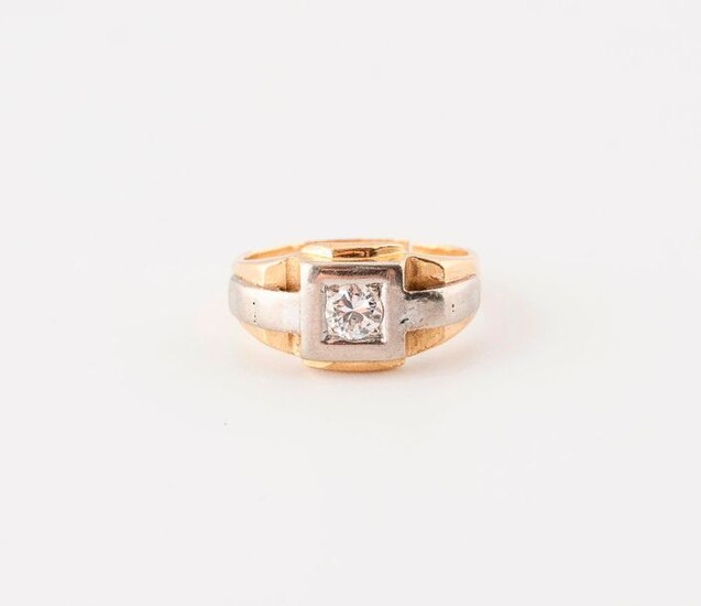 Yellow and white gold (750) Tank type ring set with an old fashioned brilliant cut diamond, about 0.20 carat, in grit setting on a square bezel.