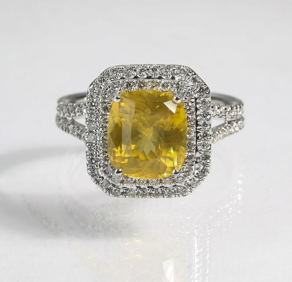 Yellow sapphire, diamond and 18k ring