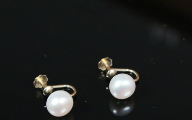 pearl earrings.