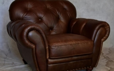 Brown leather lounge chair