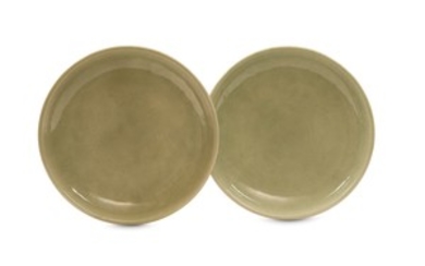 A PAIR OF CHINESE INCISED CELADON DISHES. Qing...