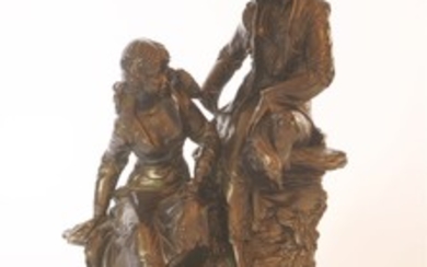 A composition bronzed finish figure