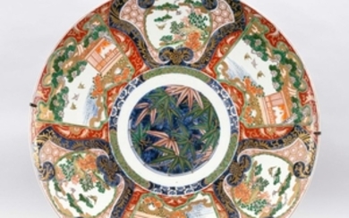IMARI PORCELAIN CHARGER With unusual red, gold and green bamboo center surrounded by chidori cartouches.