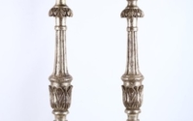 A pair of Italian silvered carved wood floor...