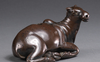 A bronze 'ox' water dropper