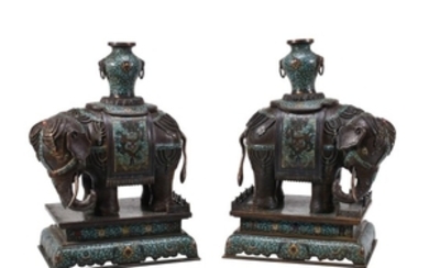 A pair of Chinese bronze Cloisonné and Champlevé enamel elephants