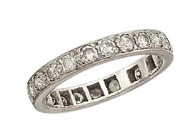 A diamond eternity ring, composed of a...