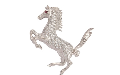 A diamond horse brooch Designed as a rampant...