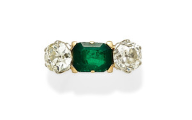 An emerald, diamond, platinum and 18k gold ring