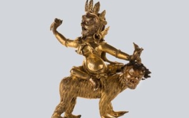 A Gilt Bronze Figure of Dongmarma Riding a Demon Rakshasa(Buddha), Tibet, 18th Century.